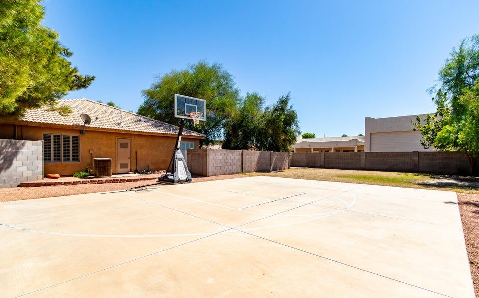 Sport court area before — empty lot Solterra Haus Mesa AZ