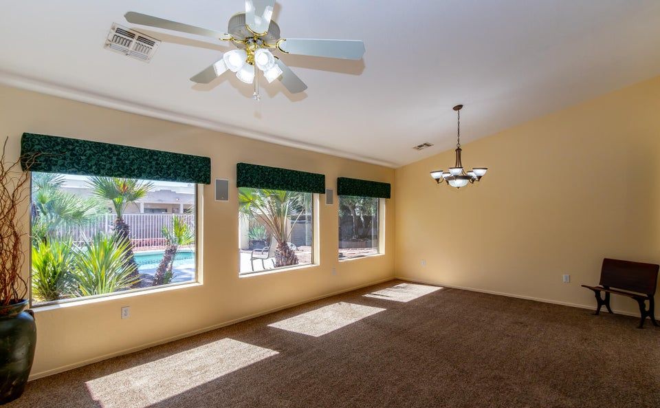 Game room before — empty garage space Solterra Haus Mesa