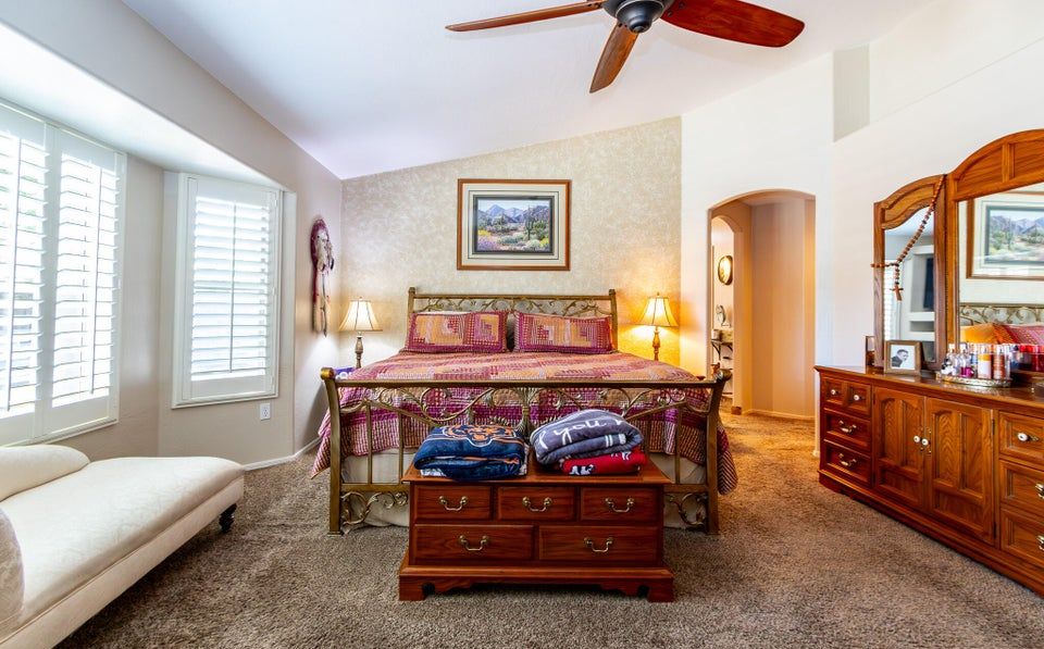 Primary suite before — empty bedroom vacant Mesa home