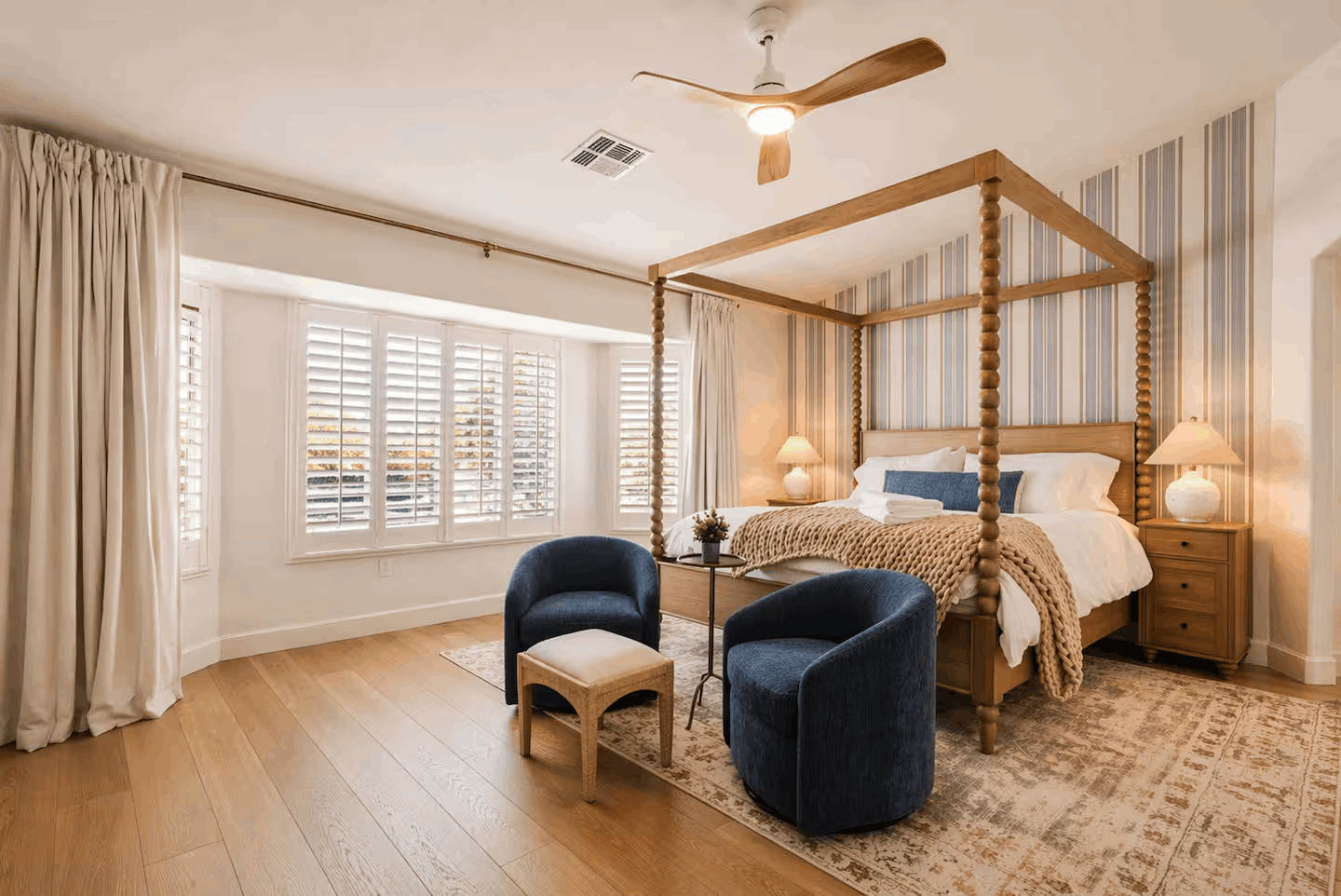 Primary suite after — luxury king bedroom Solterra Haus STR