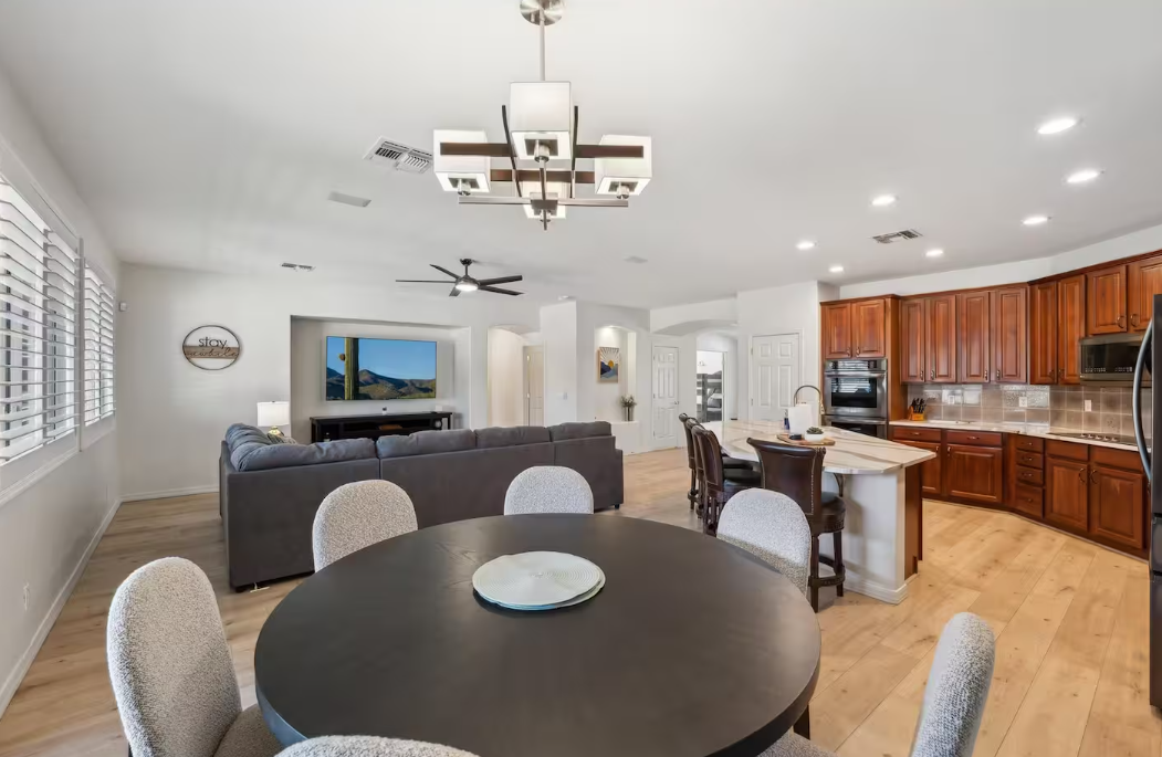 Living, dining, and kitchen area inside the Palm Valley, Goodyear AZ short-term rental at 14632 West Columbus Avenue