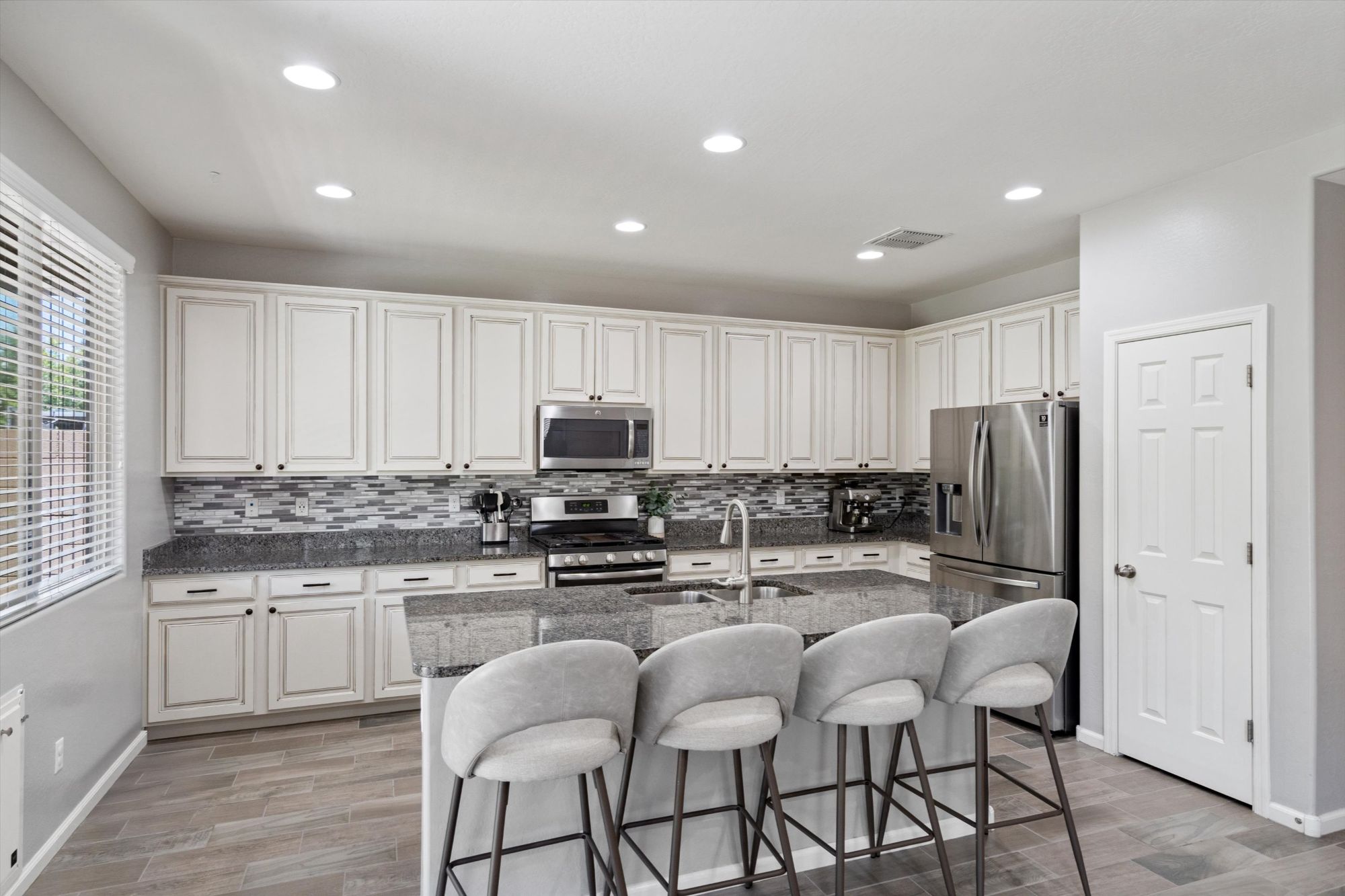 Kitchen inside the Heritage Street home in Verrado, Buckeye AZ, shown as-is at the time of sale.