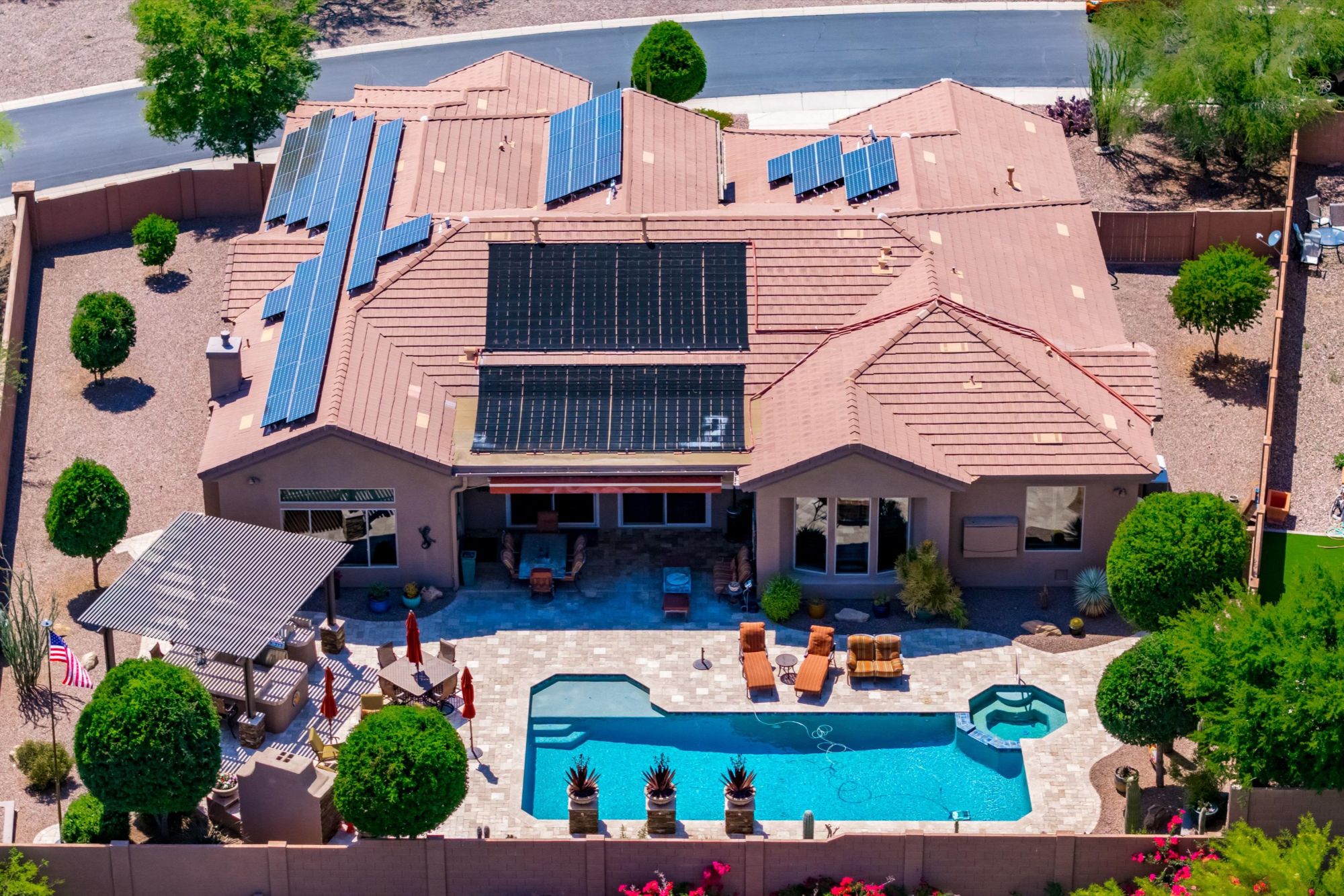 Aerial view of an Arizona home with rooftop solar panels