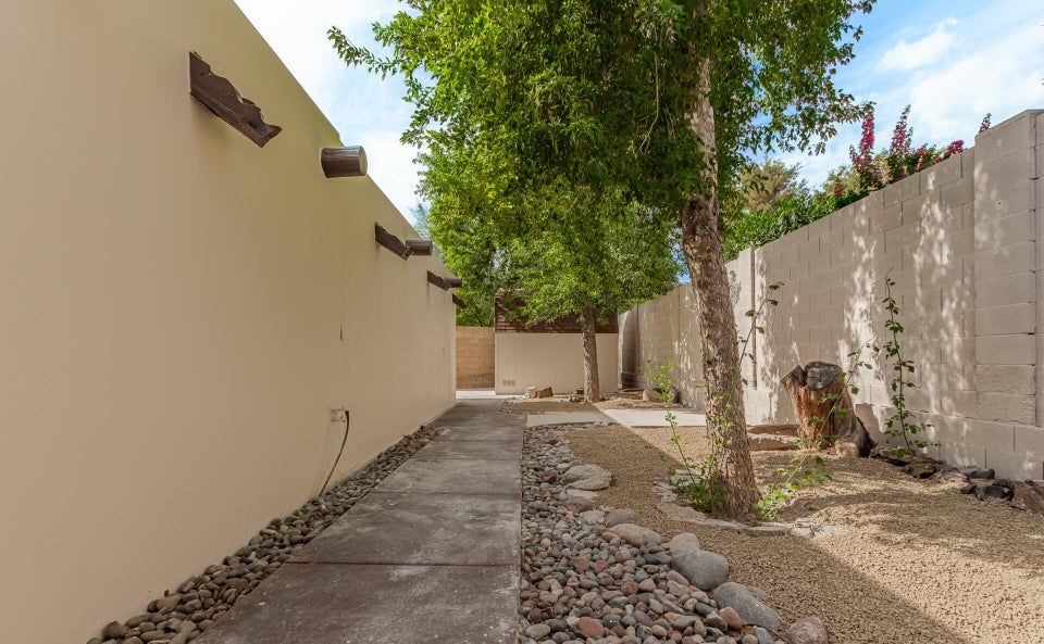 Backyard spa and sauna area before