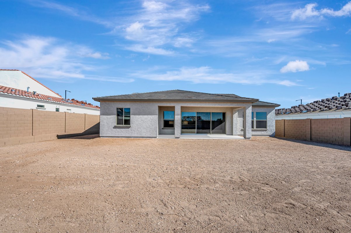 Standard new construction backyard — graded dirt lot at closing, Phoenix Metro