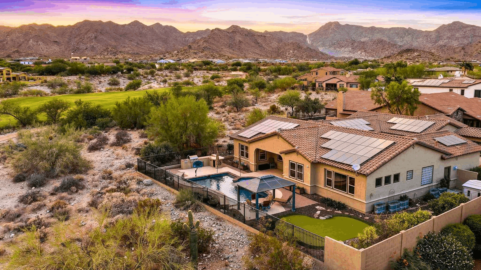 21433 W Mule Deer Way, Verrado, Buckeye AZ, exterior at golden hour
