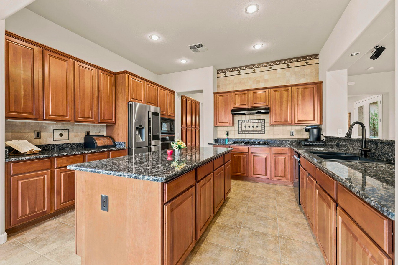 Kitchen prior to countertop and cabinet refinishing
