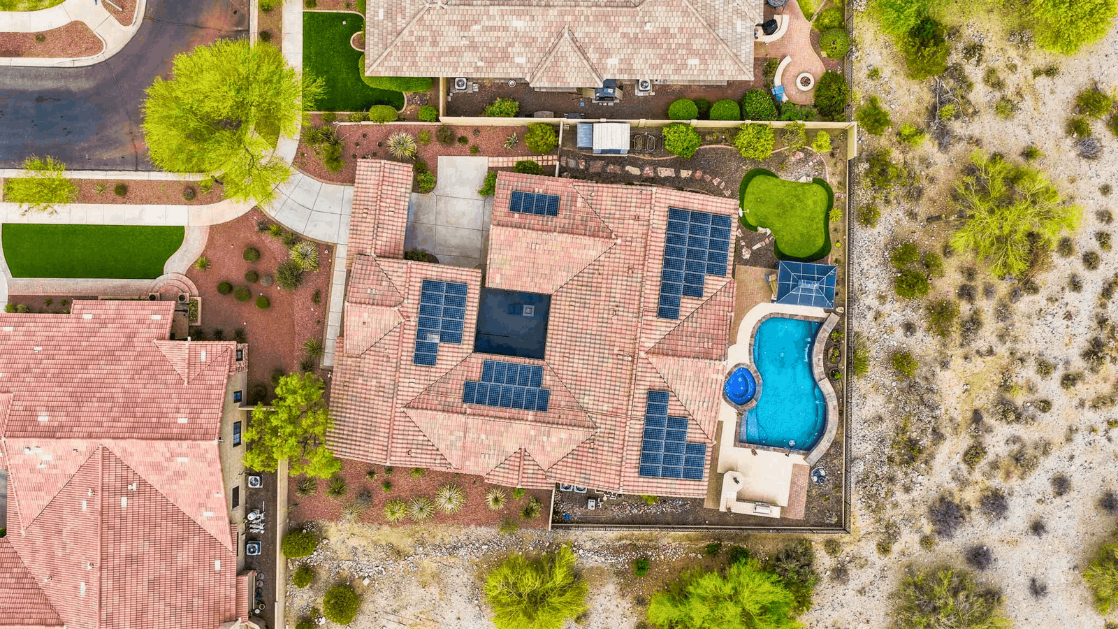 Aerial view of the new roof and owned solar panels