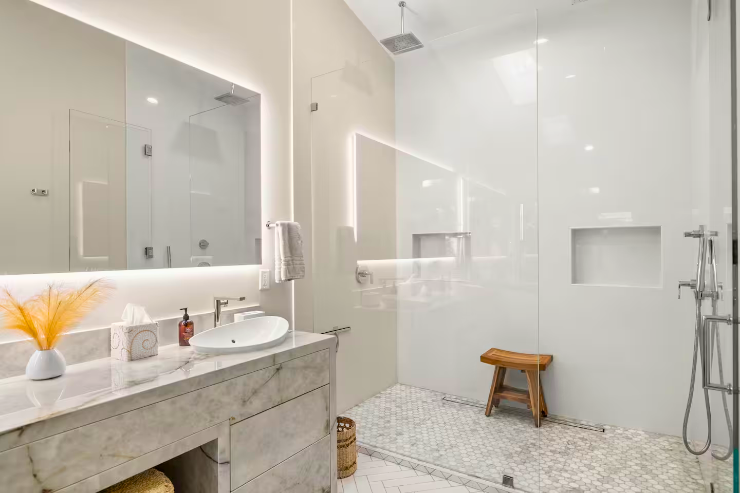 Primary bathroom with stone-wrapped vanity