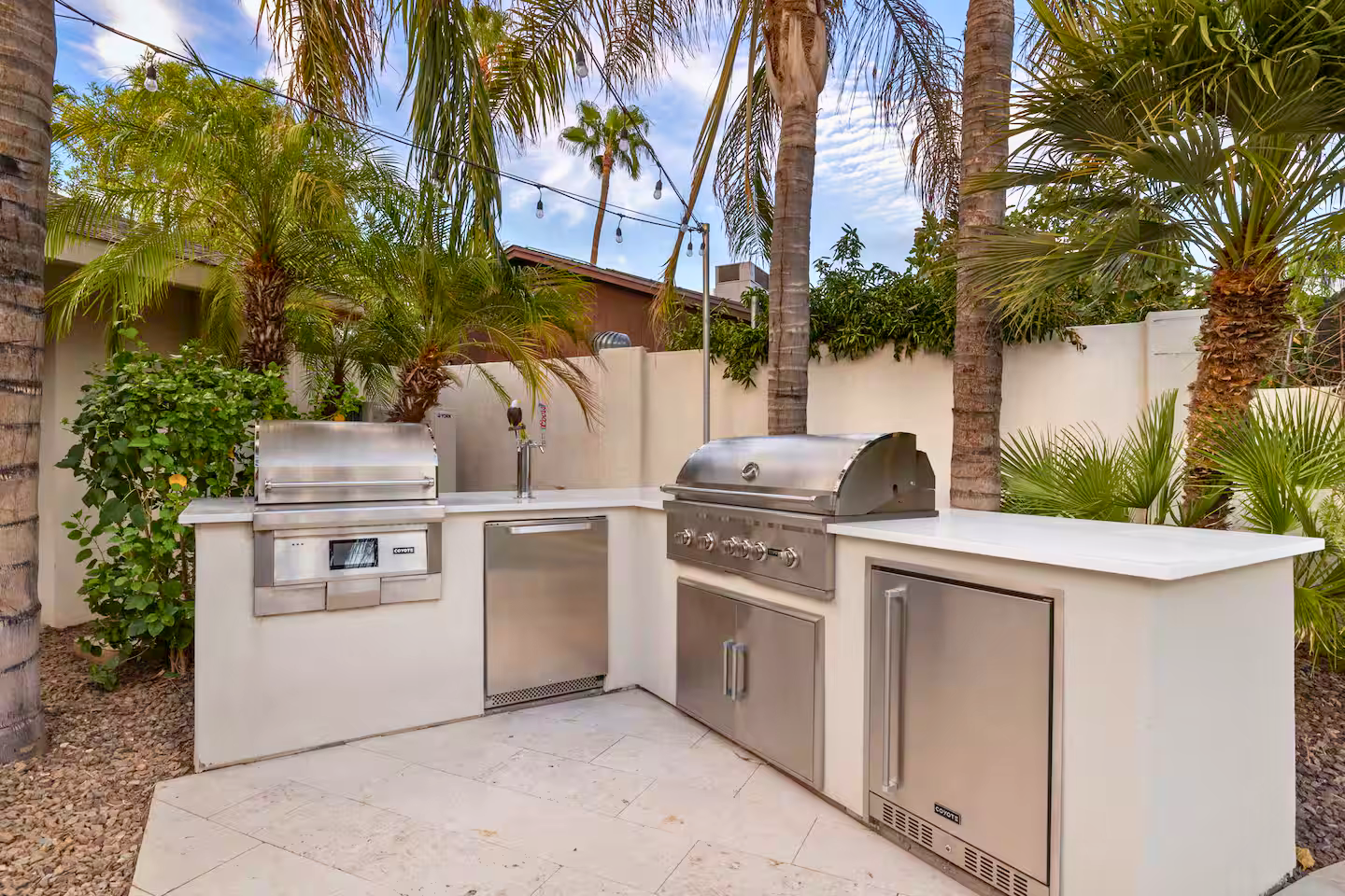 Outdoor kitchen and BBQ under the pergola