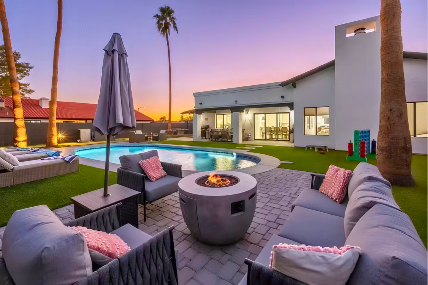 14241 N 54th St, Scottsdale — exterior and backyard at twilight