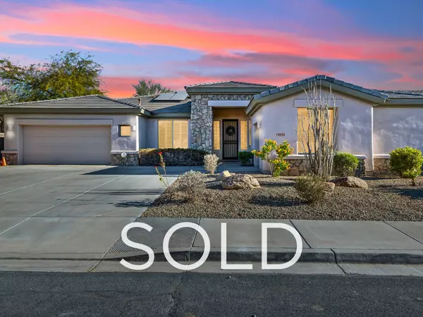 Sold Palm Valley Goodyear Arizona home at sunset featuring remodeled 5-bedroom vacation rental with owned solar, 3-car garage, desert landscaping, and golf course community—STR-friendly Palm Valley home ideal for short-term rental income and long-term appreciation.