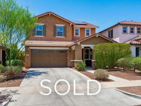 Sold single-family home at 2120 N Heritage Street in Verrado, Buckeye AZ, featuring a two-story desert-style exterior, strong curb appeal, and a full-price sale achieved through strategic marketing in the Greater Phoenix Metro real estate market.