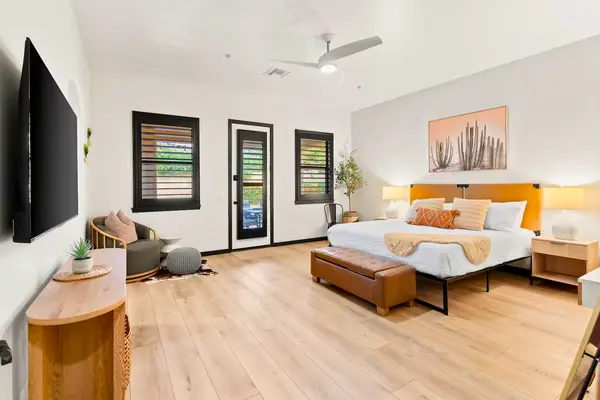 Phoenix Metro luxury primary bedroom with contemporary finishes showcasing strategic listing presentation and targeted marketing exposure.