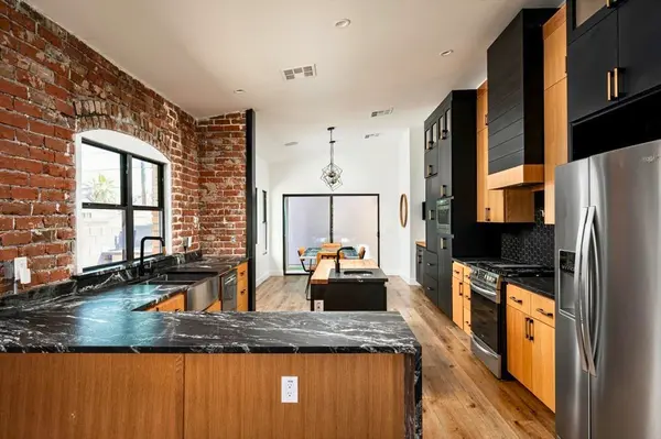 feature image of House Hacking Phoenix: How We Cut a $5,000 Mortgage to $1,700/Month