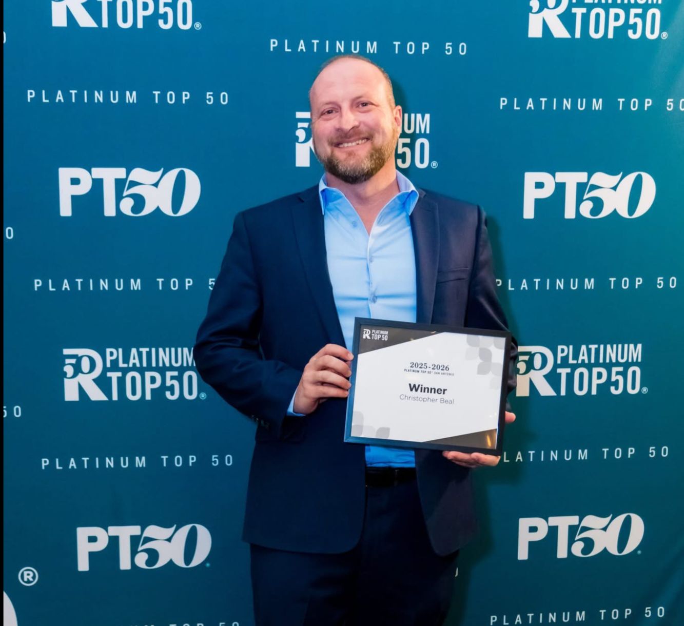 Christopher Beal receiving Platinum Top 50 Award — San Antonio