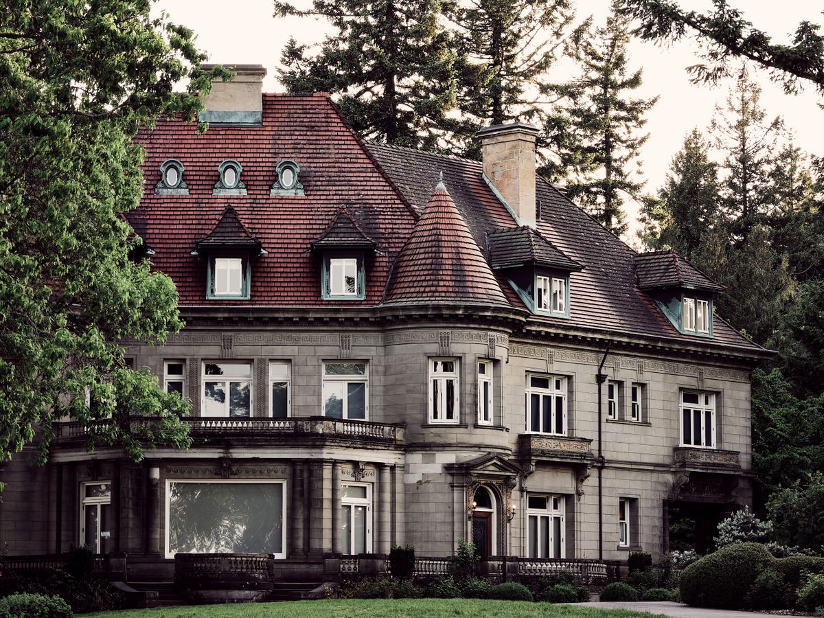 Historic Portland, Oregon home surrounded by mature greenery