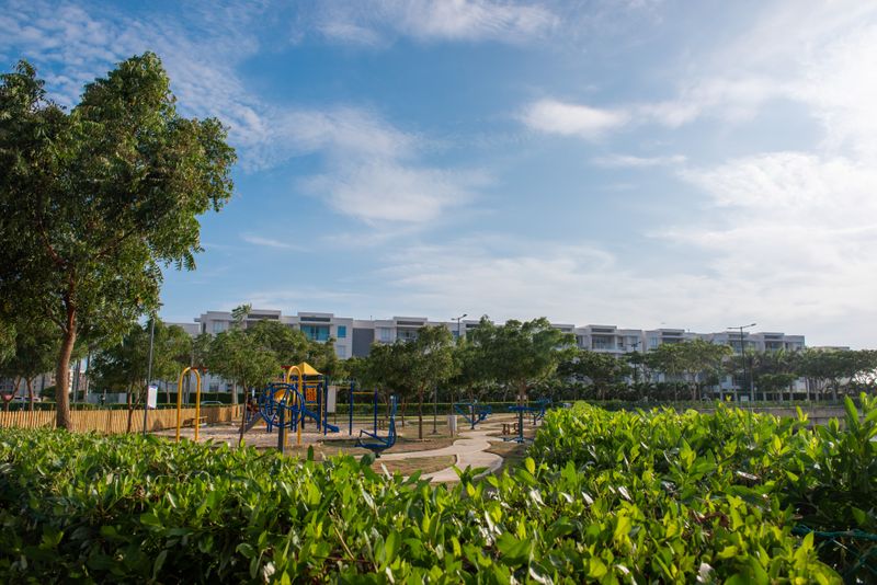 Neighborhood playground surrounded by greenery