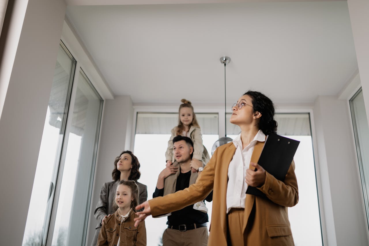 Open house with potential buyers touring