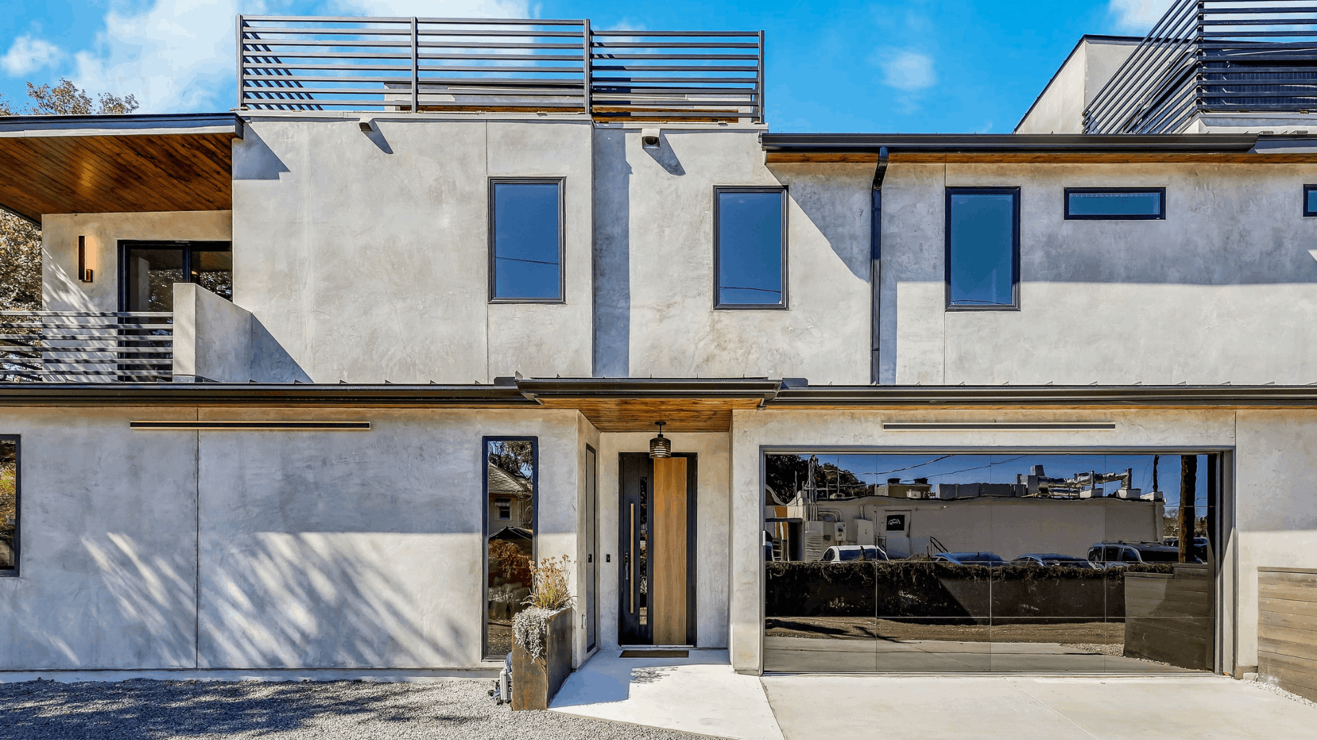 Modern stucco exterior of Acoustic at Johanna Collection new construction 78704 Austin TX.