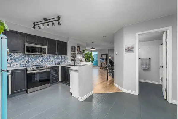 1121 6 AVE SW #1004, Calgary, AB T2P 5J4