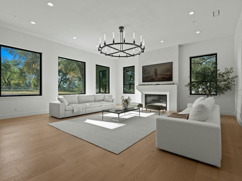 Light-filled luxury interior with floor to ceiling windows