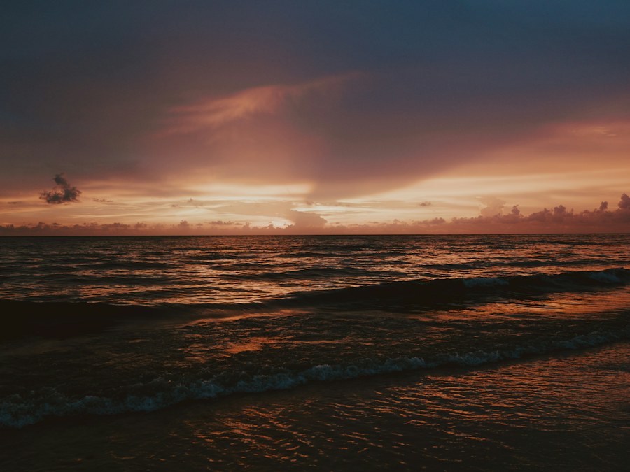 Gulf surf at sunset along the Pelican Bay shoreline in Naples