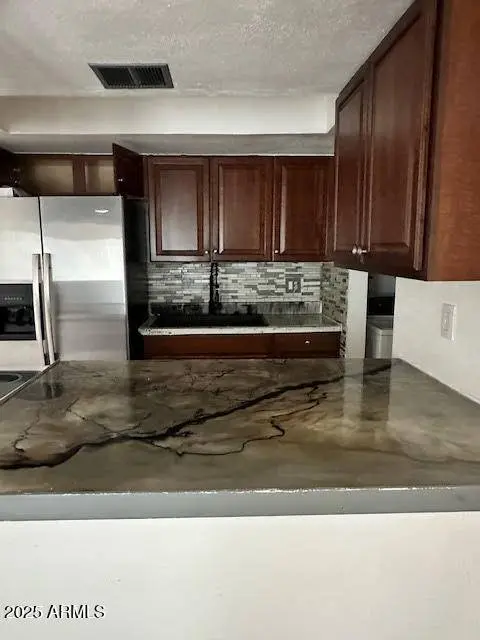 8574 E INDIAN SCHOOL Road #F, Scottsdale, AZ 85251