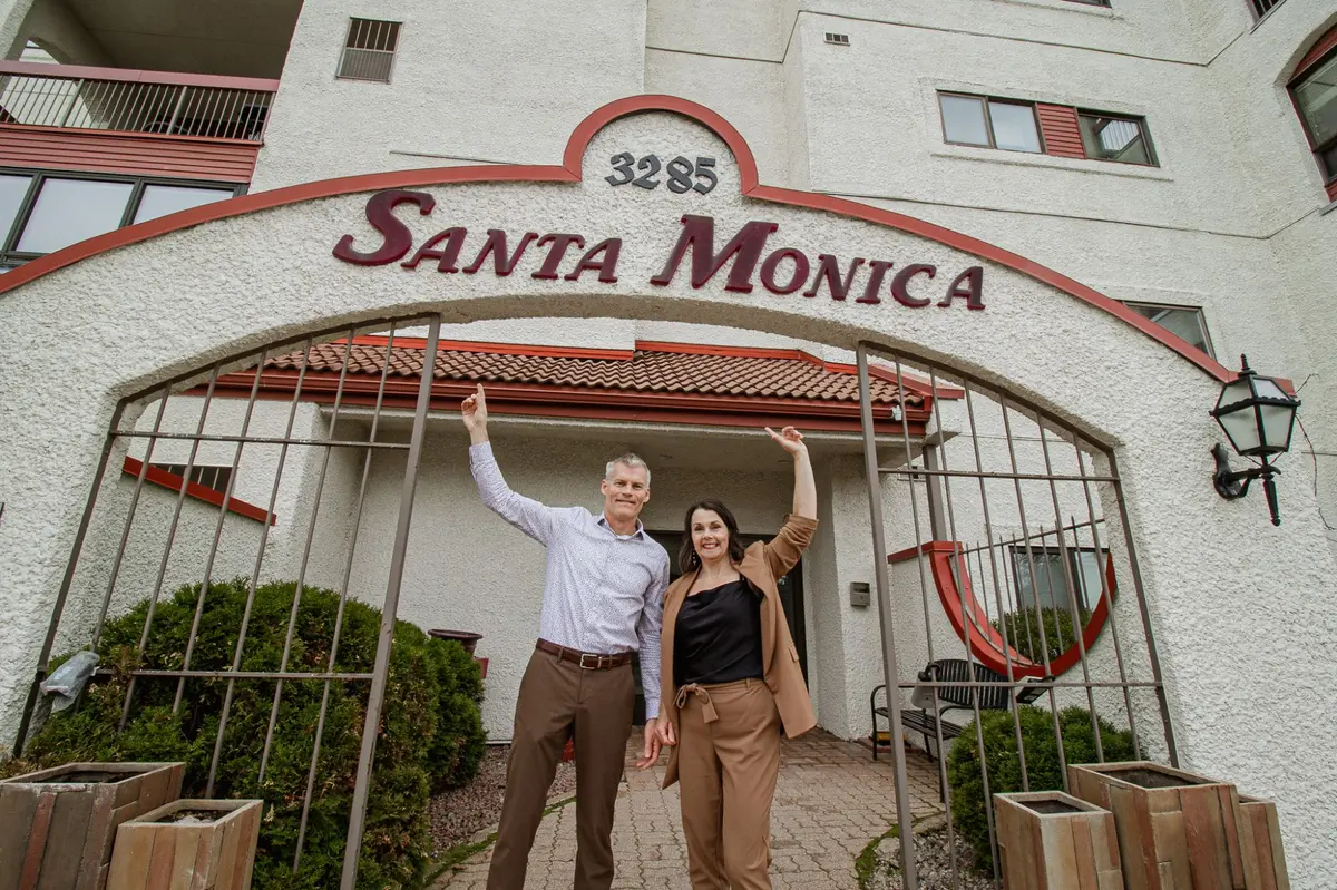 Karen and Jeff stand outside the Santa Monica Building