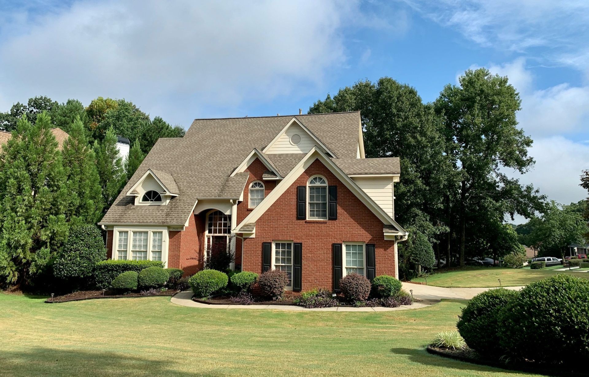 clean home exterior with a cut lawn