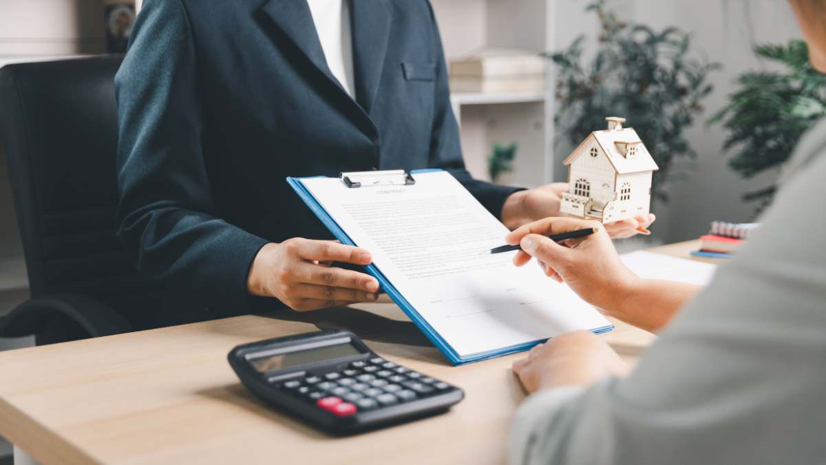 Family reviewing escrow paperwork during home purchase in Texas