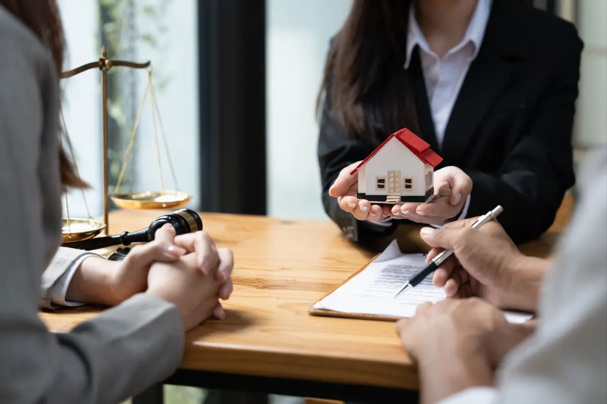 real-estate-lawyers-discussing-agreement-at-office-2026-01-07-01-22-24-utc