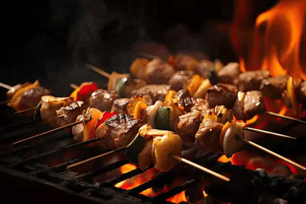 Inside/Outside Grill Safely This Summer: Tips for National Grilling Month
