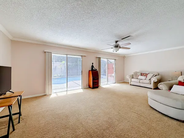 Living Room with a view of the pool