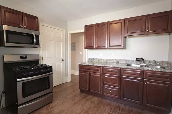 64 Harrison AVE, Woonsocket, RI 02895