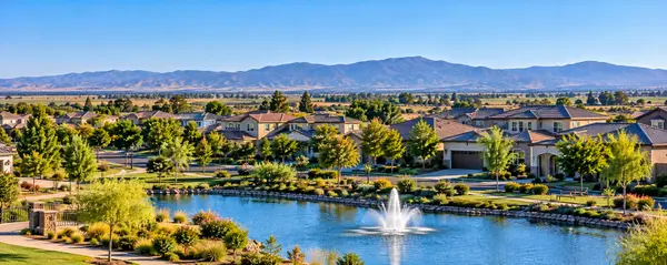 Serene Suburban Lake and Mountain Vista
