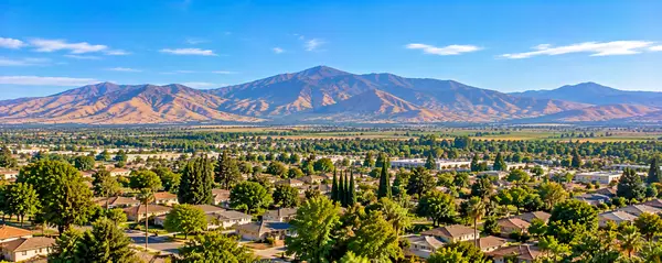 Sunlit Suburban Valley and Mountains