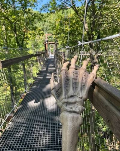 Skelton on a bridge in at Holden Arboretum Skeleton Fest