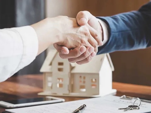 Happy family working to purchase a home with Will Flanagan Realty Group in Oklahoma City