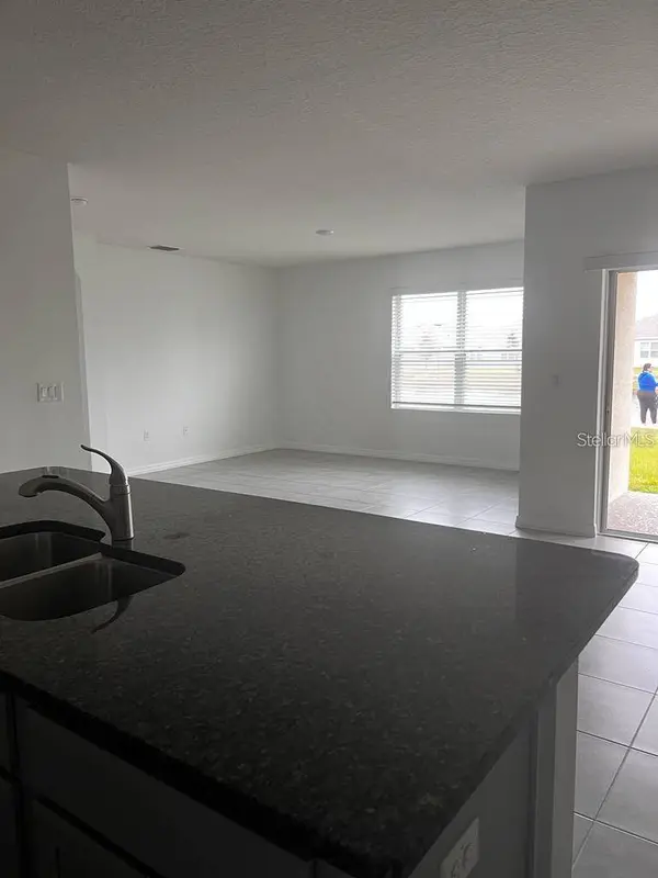 521 NICKEN GRV, Davenport, FL 33837