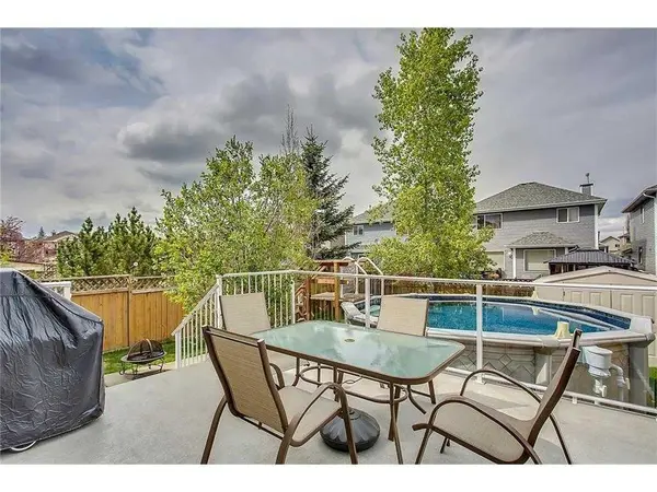 64 Bridlewood Gdns SW, Calgary, AB T2Y 3X6
