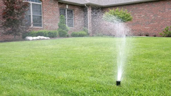 feature image of Should You Water Your Lawn in the Fall?
