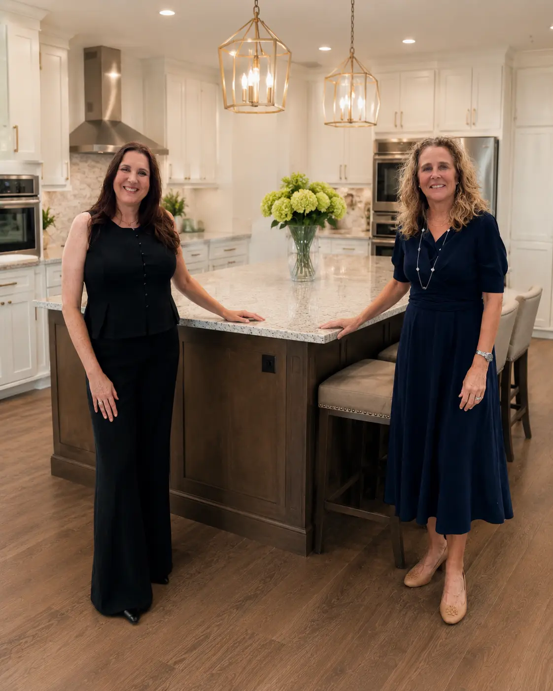 Claudia Werner and Anja Drewes Neidhardt in a modelhome kitchen