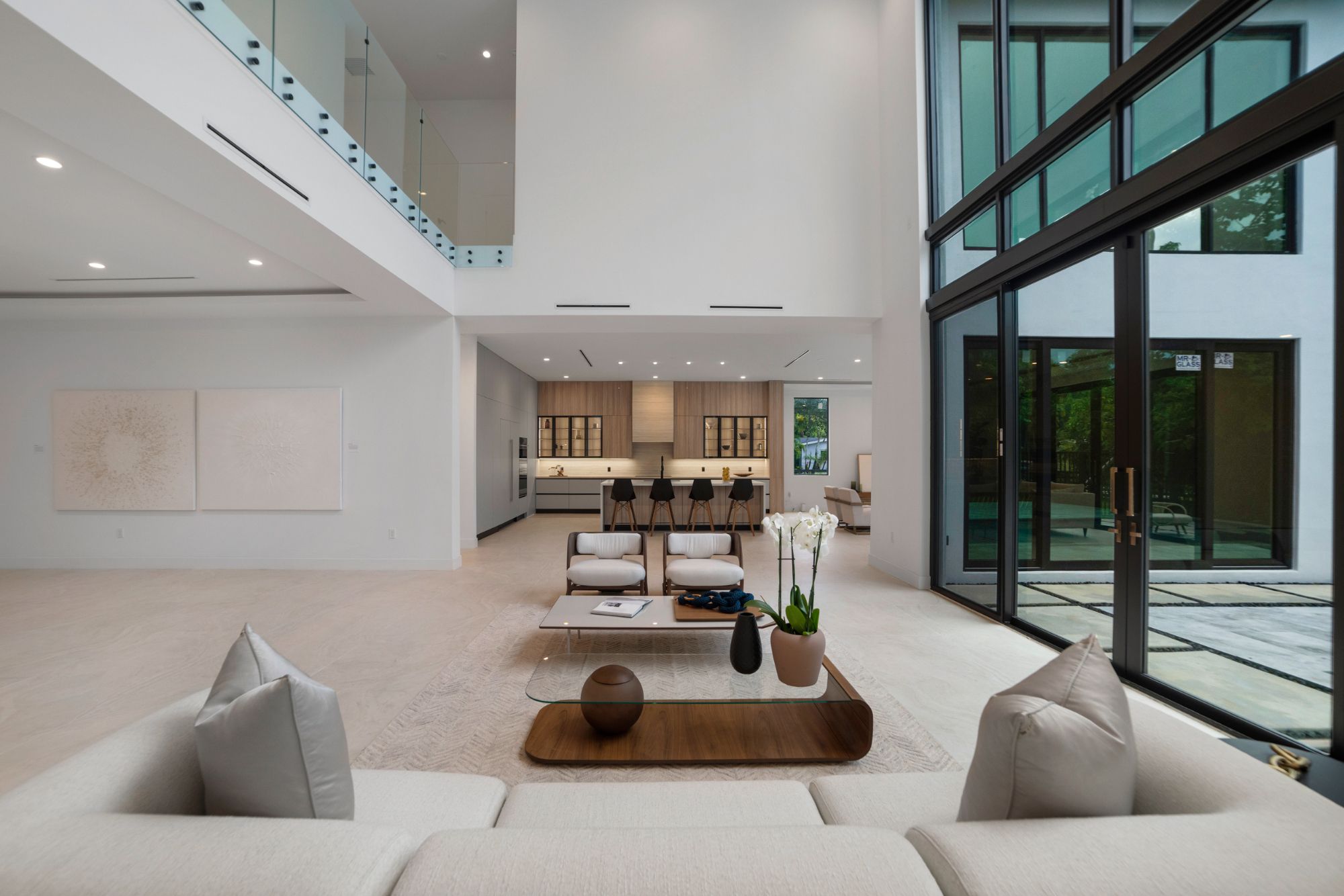 Architectural plans on a desk for pre listing renovation planning in Weston FL