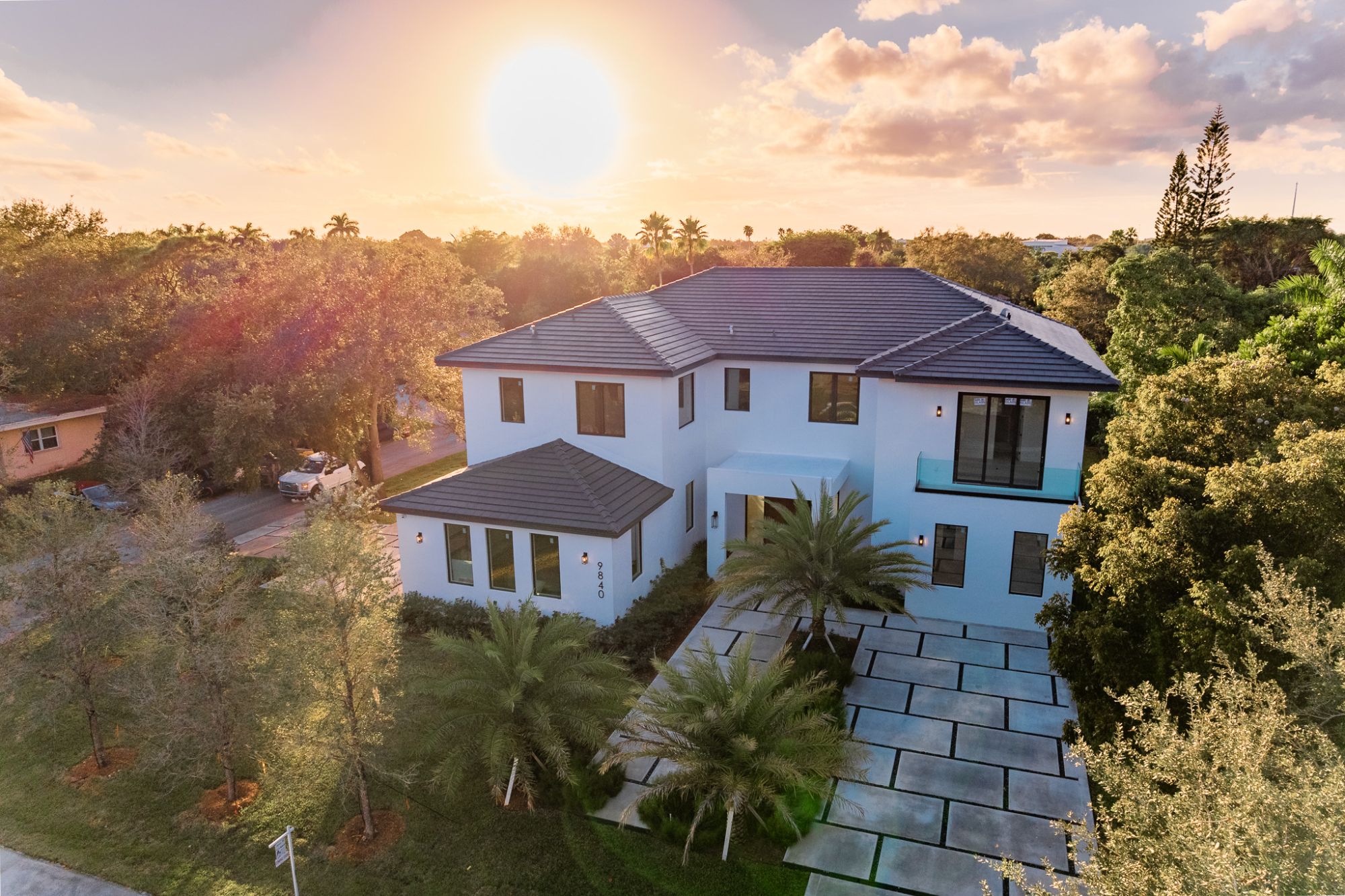 Twilight exterior of a luxury home in Weston Florida positioned strategically for sale