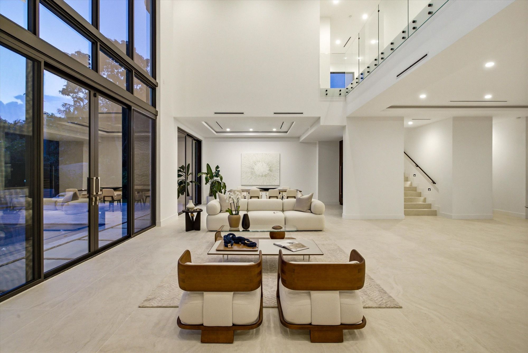 Elegantly staged living room in a Weston FL luxury home with natural light
