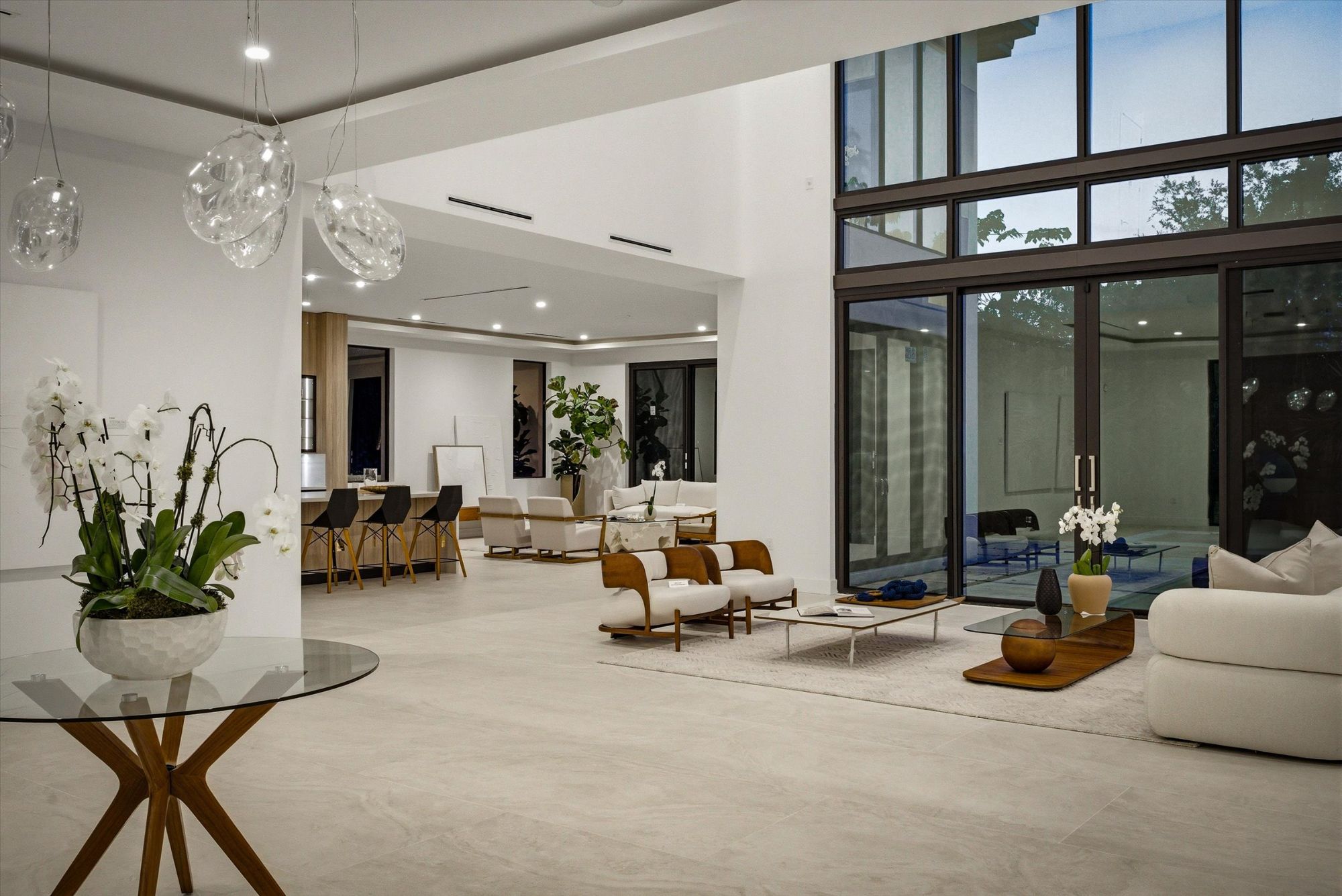 Weston FL homeowner reviewing capital gains tax documents before listing luxury home