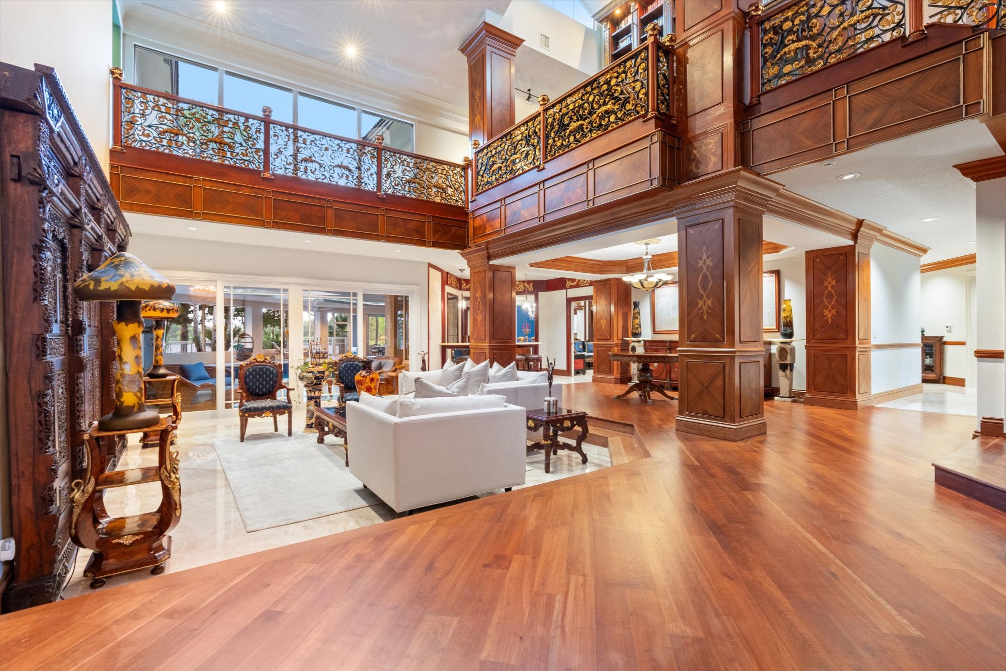 Luxury estate home in a Weston FL HOA community with stone driveway and tropical landscaping