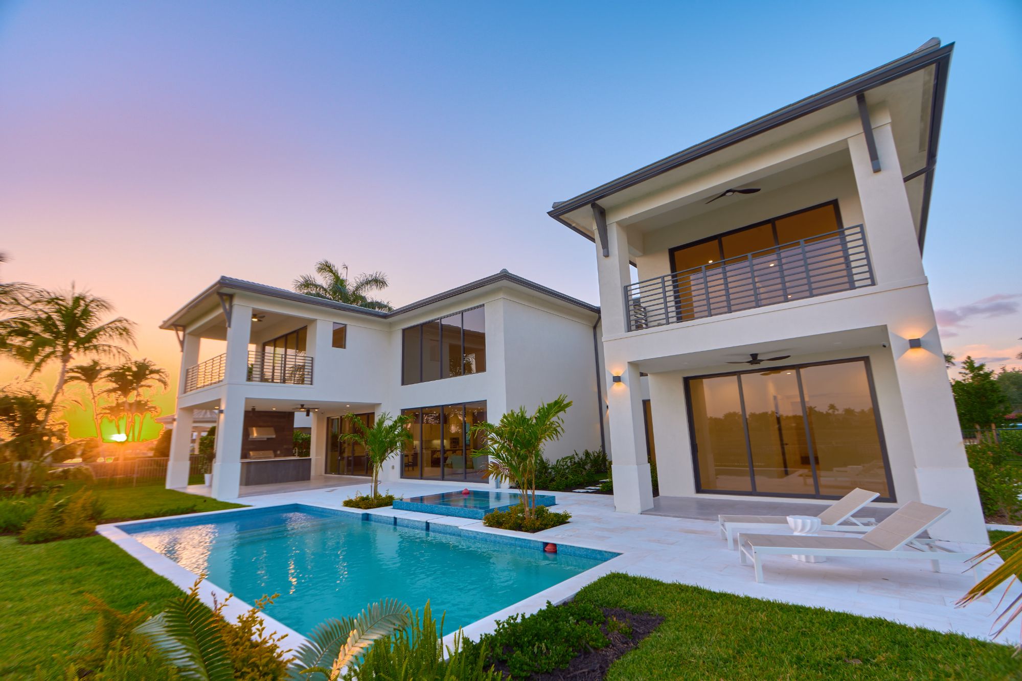 Staged outdoor lanai at a Weston Florida luxury estate at twilight.