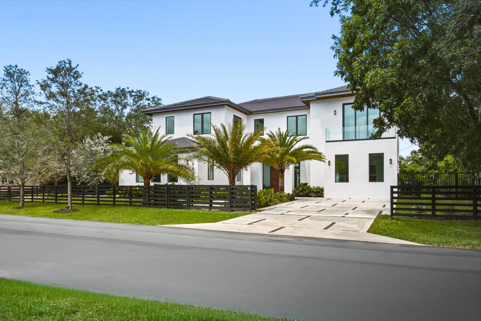 Private gated entrance to a Southwest Ranches luxury investment estate.